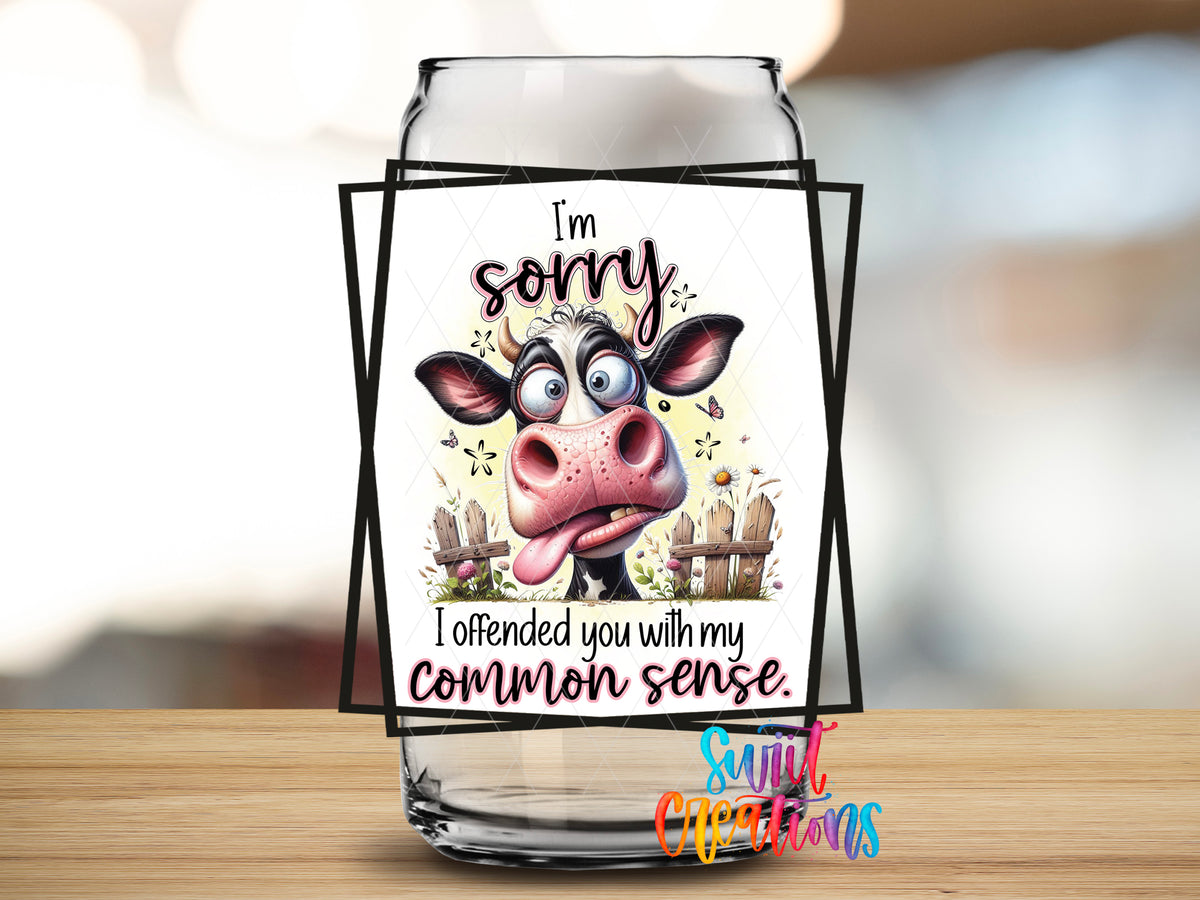 Sorry I Offended You Cow design close-up on a clear glass can tumbler