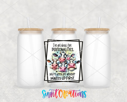 Five Personalities Cow frosted glass tumbler group view with lids and straws