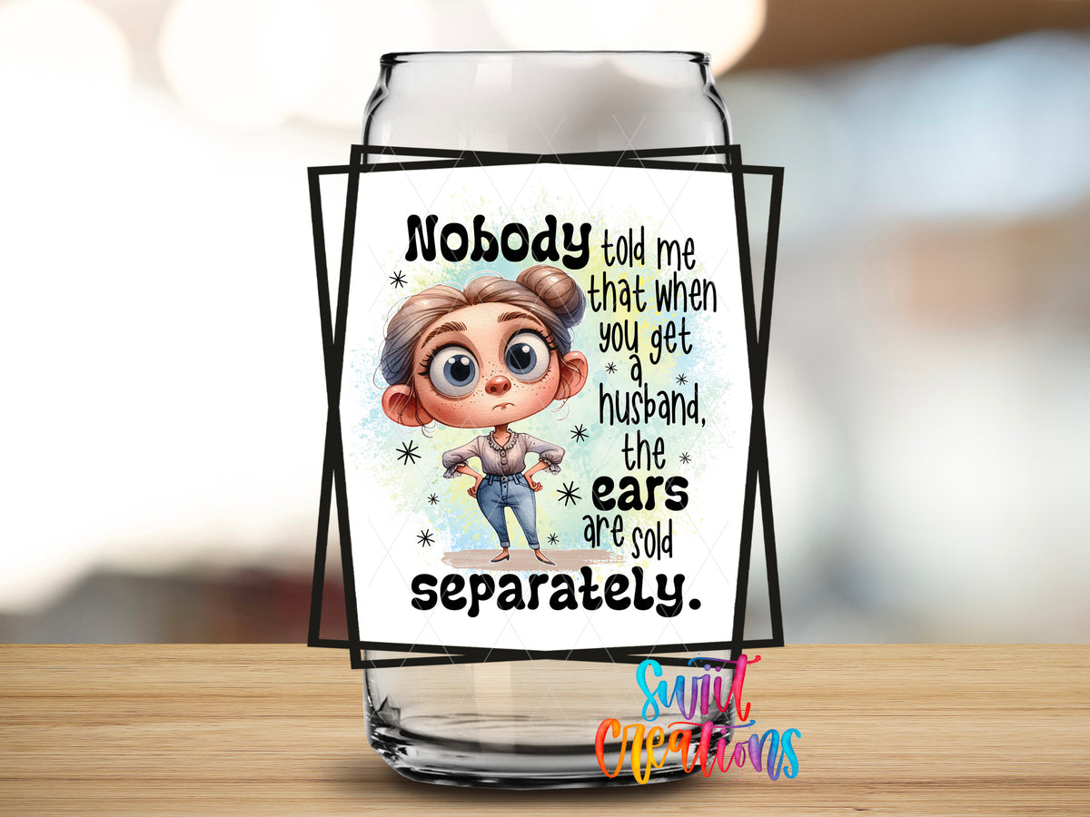 Husband Ears Sold Separately design close-up on a clear glass can tumbler