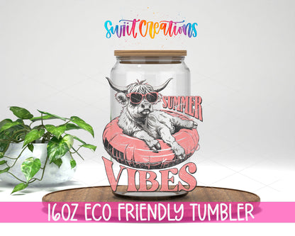 Summer Vibes Cow design on a 16 oz clear glass tumbler with bamboo lid