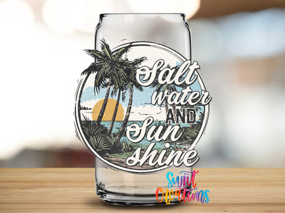 Salt Water and Sunshine Palms design close-up on a clear glass can tumbler