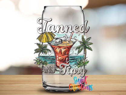 Tanned and Tipsy Cocktail design close-up on a clear glass can tumbler