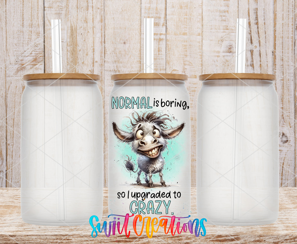 Normal Is Boring frosted glass tumbler mockup with bamboo lids and straws