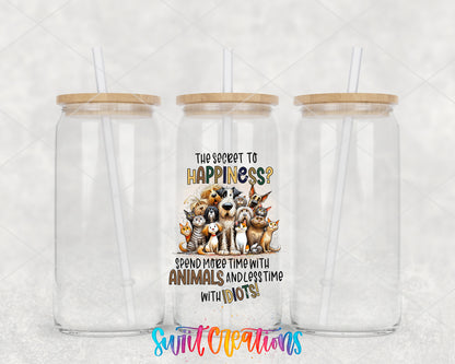 The Secret to Happiness Animals clear glass tumbler group mockup with bamboo lids and straws