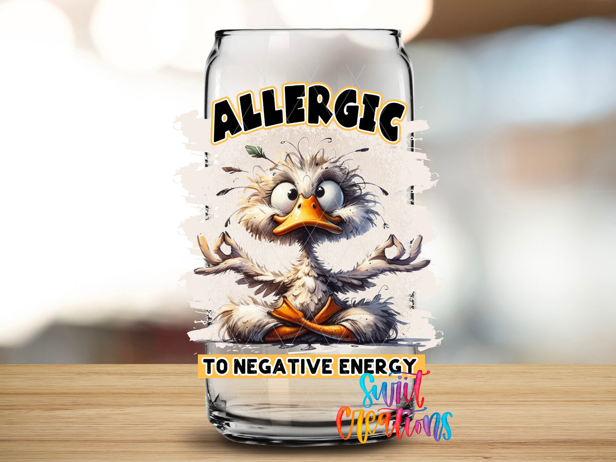 Allergic to Negative Energy design close-up on a clear glass can tumbler
