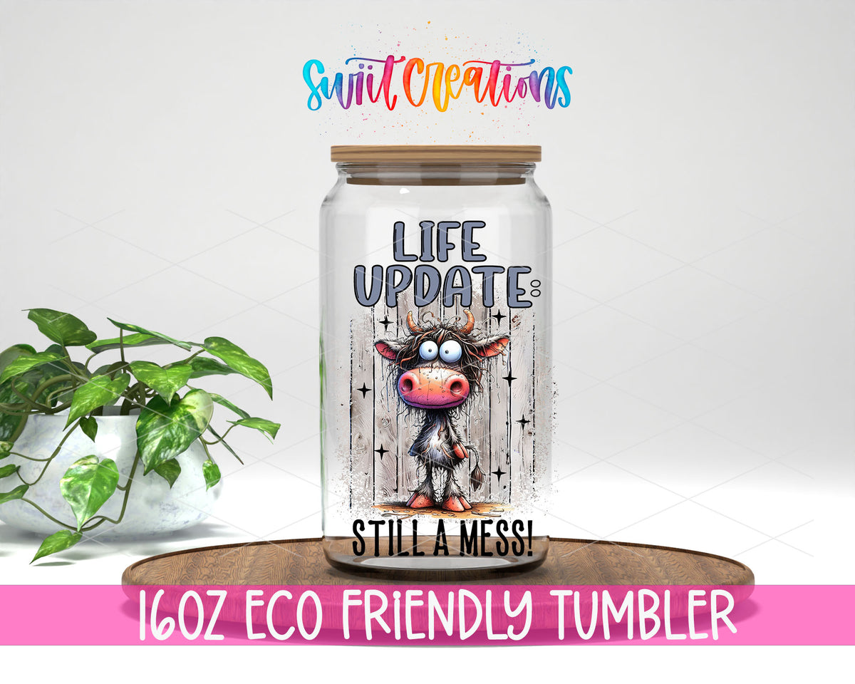 Life Update Still a Mess design on a 16 oz clear glass tumbler with bamboo lid