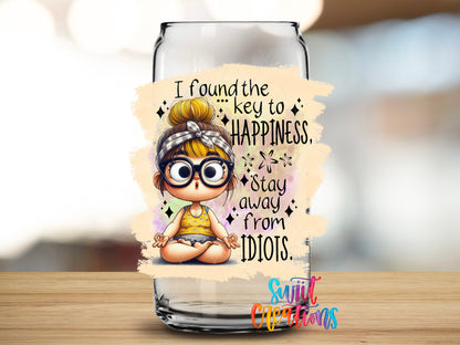 Key to Happiness design close-up on a clear glass can tumbler