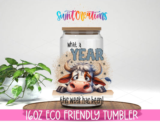 What a Year This Week Has Been design on a 16 oz clear glass tumbler with bamboo lid