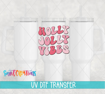 Swiit Creations UV DTF Holly Jolly Vibes Christmas transfer shown on a white tumbler set
