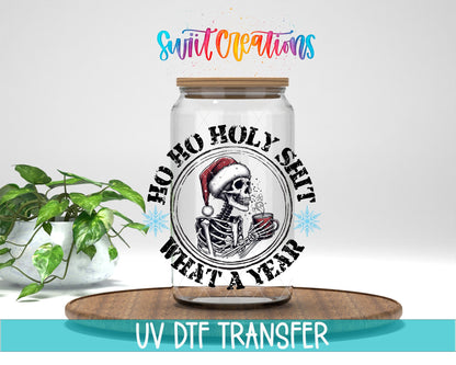Swiit Creations UV DTF Holy Shit What a Year Christmas transfer displayed on a clear jar mockup