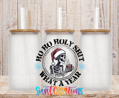 Swiit Creations UV DTF Holy Shit What a Year Christmas transfer shown on a clear glass can set