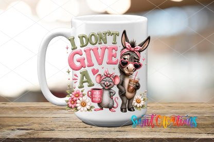 I Don't Give A Rat's Ass Donkey Mouse UV DTF transfer displayed on a white ceramic mug from Swiit Creations