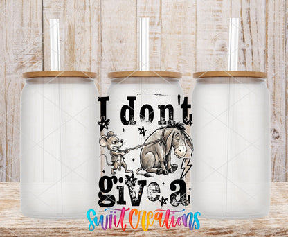 I Don’t Give A Rat’s Ass UV DTF transfer applied to a clear glass can set from Swiit Creations