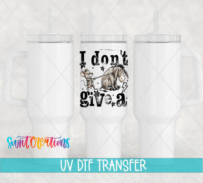I Don’t Give A Rat’s Ass UV DTF transfer applied to a white tumbler set from Swiit Creations