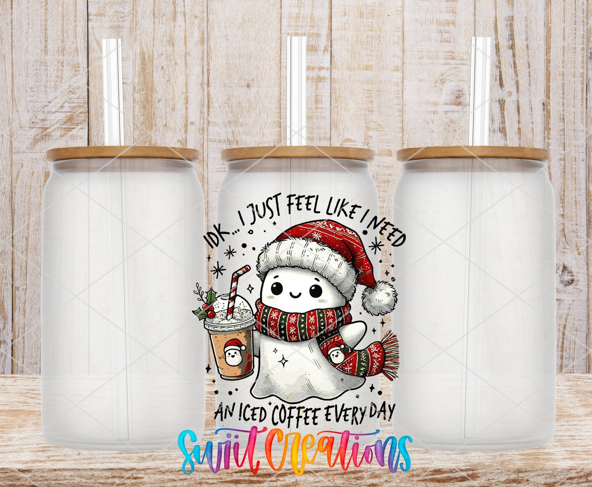 I Don’t Just Feel Like I Need An Iced Coffee Everyday Christmas Ghost UV DTF transfer applied to a clear glass can set from Swiit Creations