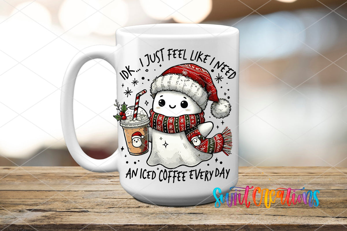 I Don’t Just Feel Like I Need An Iced Coffee Everyday Christmas Ghost UV DTF transfer displayed on a white ceramic mug from Swiit Creations