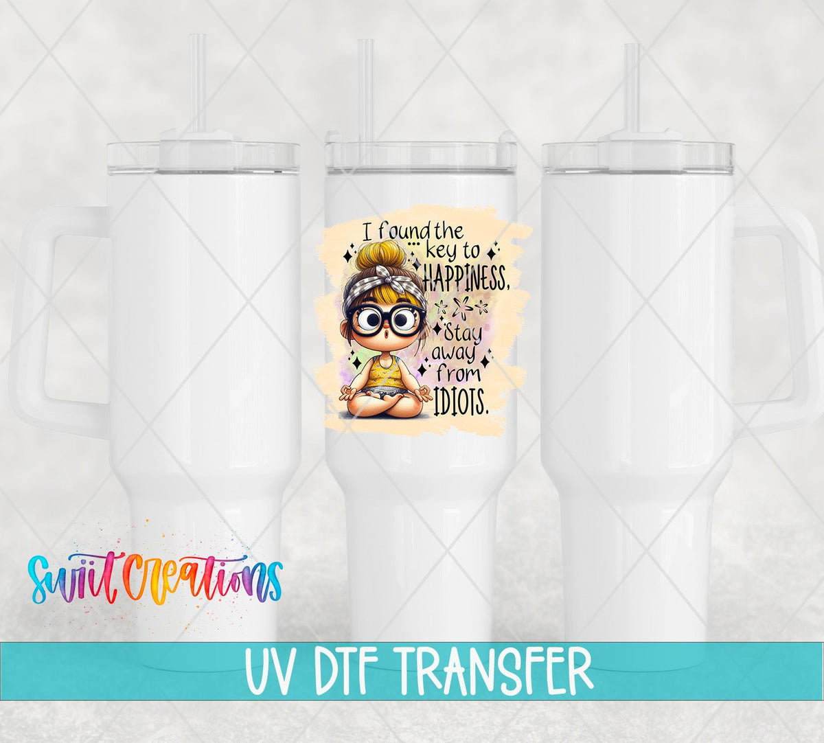 Swiit Creations UV DTF I Found the Secret to Happiness transfer shown on a white tumbler set