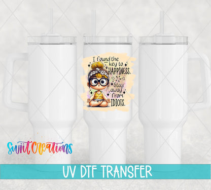 Swiit Creations UV DTF I Found the Secret to Happiness transfer shown on a white tumbler set