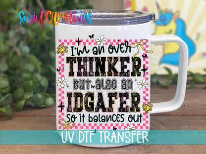 I’m An Over Thinker But Also An IDGAFer UV DTF transfer displayed on a white coffee mug from Swiit Creations