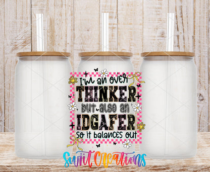 I’m An Over Thinker But Also An IDGAFer UV DTF transfer applied to a clear glass can set from Swiit Creations