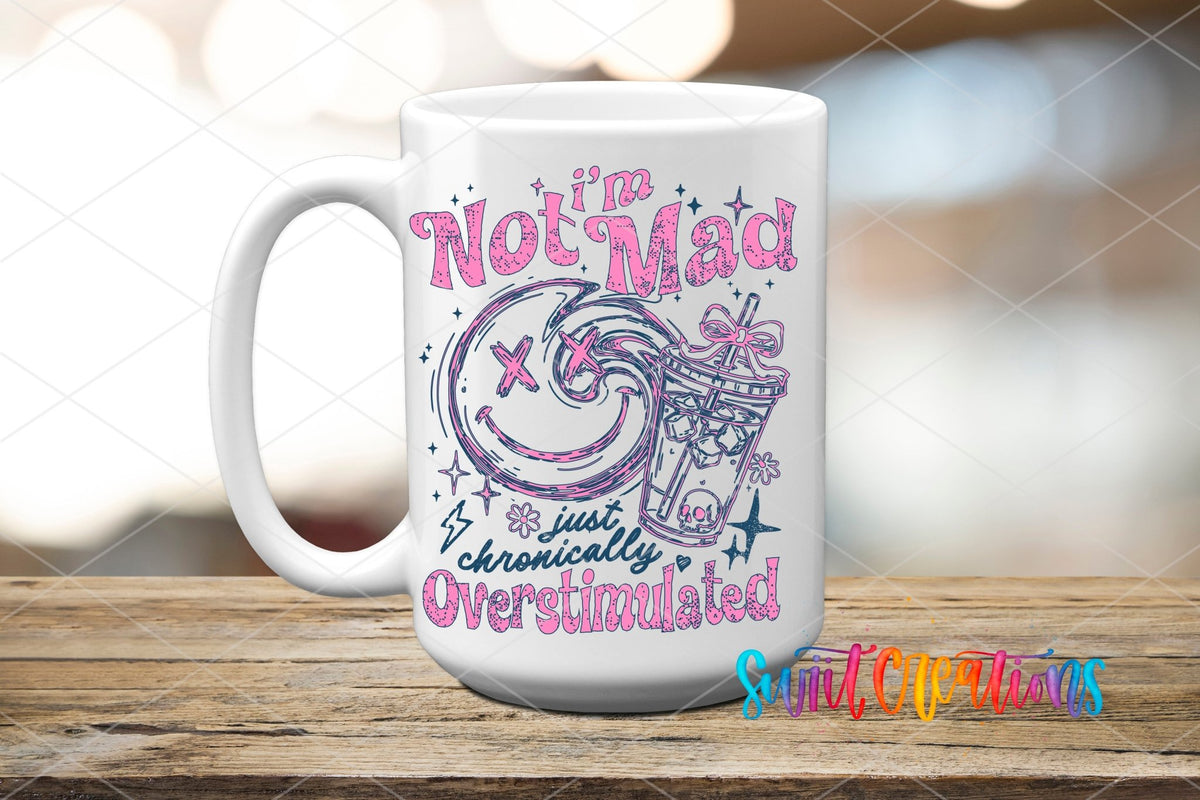 I’m Not Mad, Chronically Overstimulated UV DTF transfer displayed on a white ceramic mug from Swiit Creations