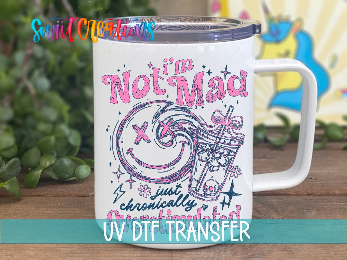 I’m Not Mad, Chronically Overstimulated UV DTF transfer displayed on a white coffee mug from Swiit Creations