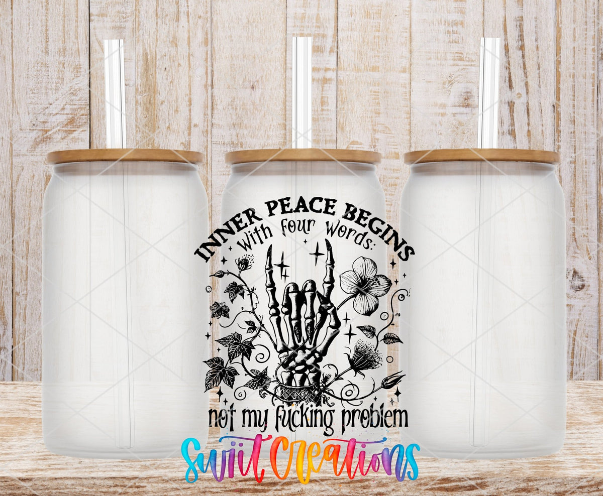 Inner Peace Begins With Four Words UV DTF transfer applied to a clear glass can set from Swiit Creations