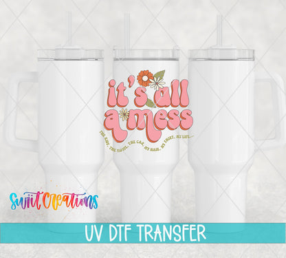 It’s All a Mess UV DTF transfer applied to a white tumbler set from Swiit Creations