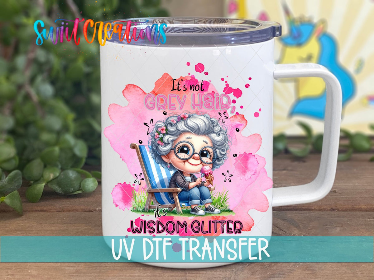 Swiit Creations UV DTF It's Not Grey Hair It's Wisdom Glitter transfer displayed on a white coffee mug