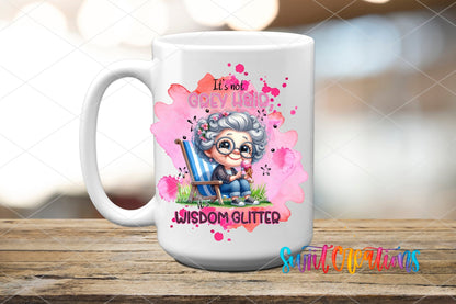 Swiit Creations UV DTF It's Not Grey Hair It's Wisdom Glitter transfer applied to a white ceramic mug