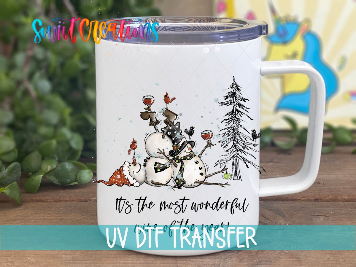 Swiit Creations UV DTF Wonderful Wine of the Year Snowman transfer displayed on a white coffee mug