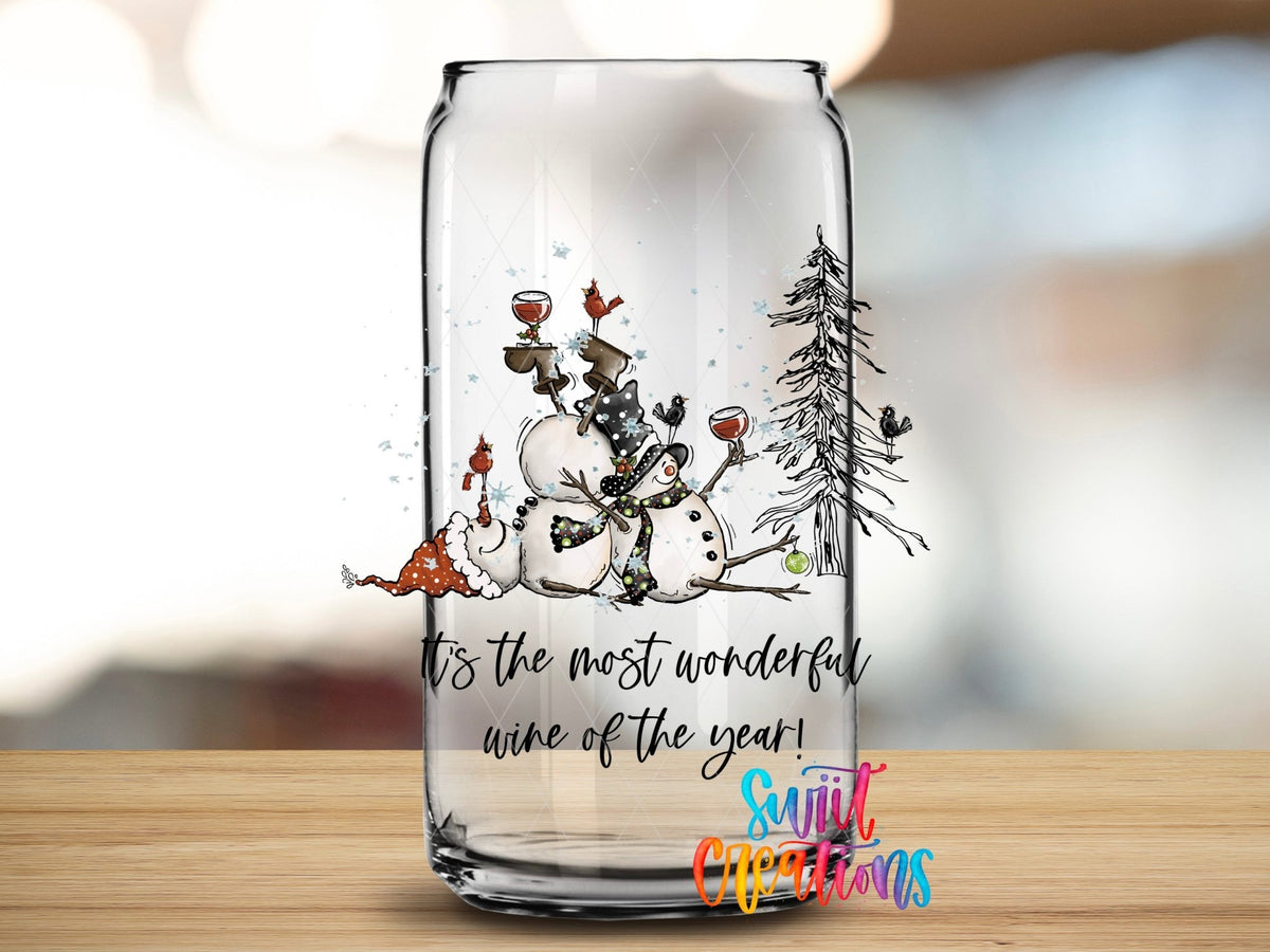 Swiit Creations UV DTF Wonderful Wine of the Year Snowman transfer applied to a clear glass can