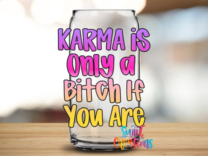 Karma Is Only A Bitch If You Are UV DTF transfer applied to a clear glass can from Swiit Creations