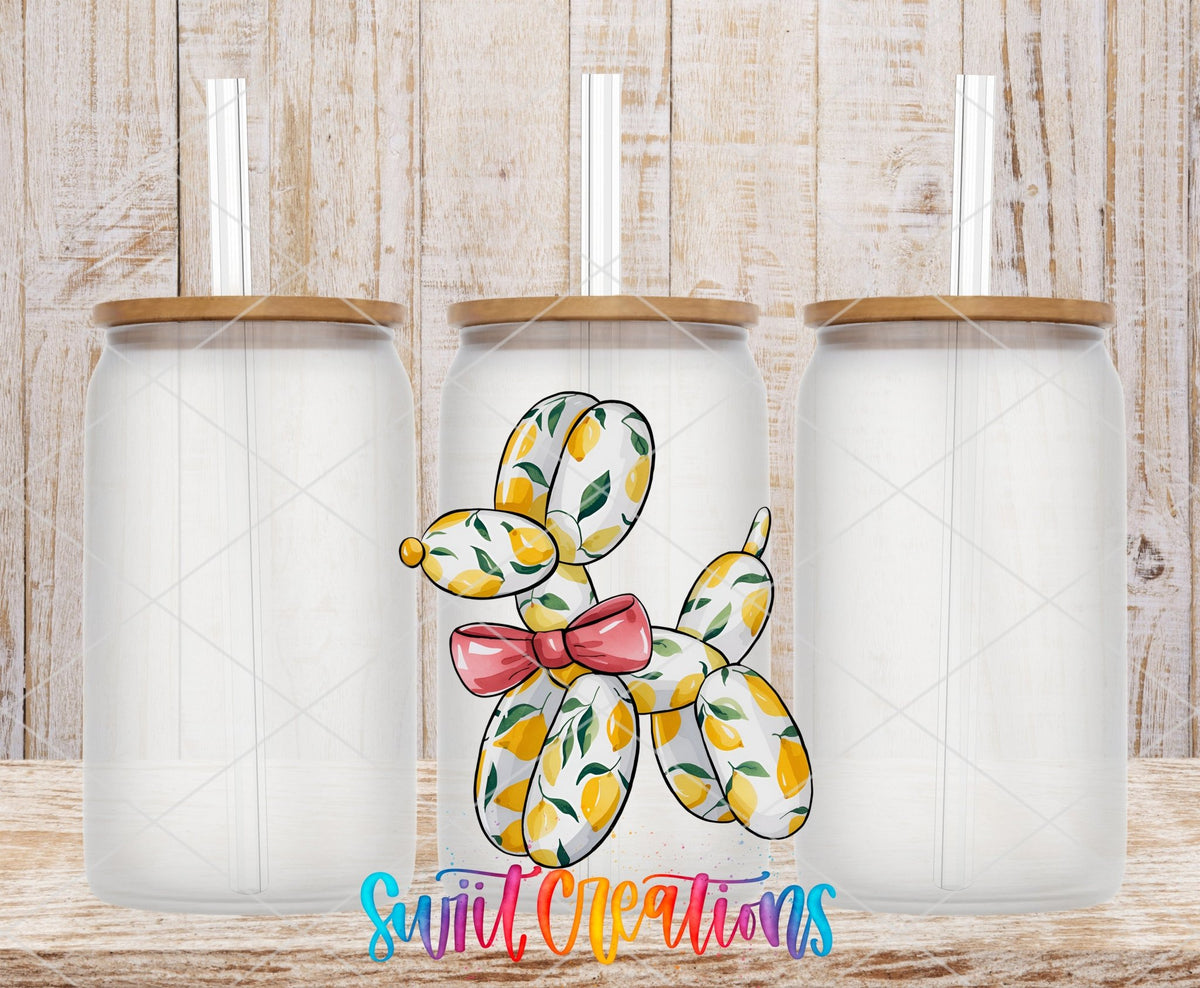 Lemon Balloon Dog UV DTF transfer applied to a clear glass can set from Swiit Creations