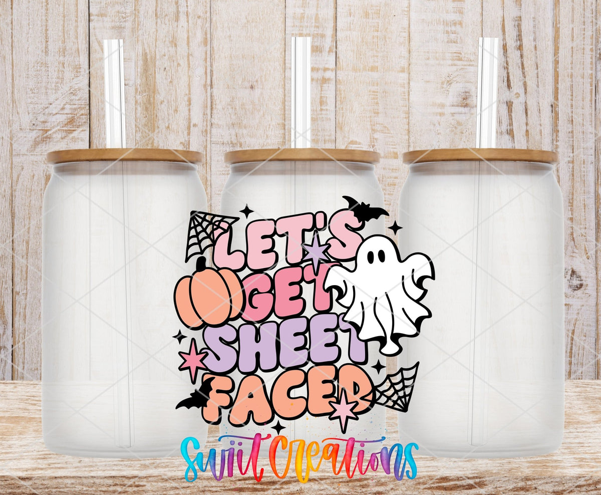 Swiit Creations UV DTF Let’s Get Sheet Faced Ghost Halloween transfer shown on a clear glass can set