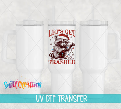 Swiit Creations UV DTF Let’s Get Trashed Christmas Raccoon transfer shown on a white tumbler set