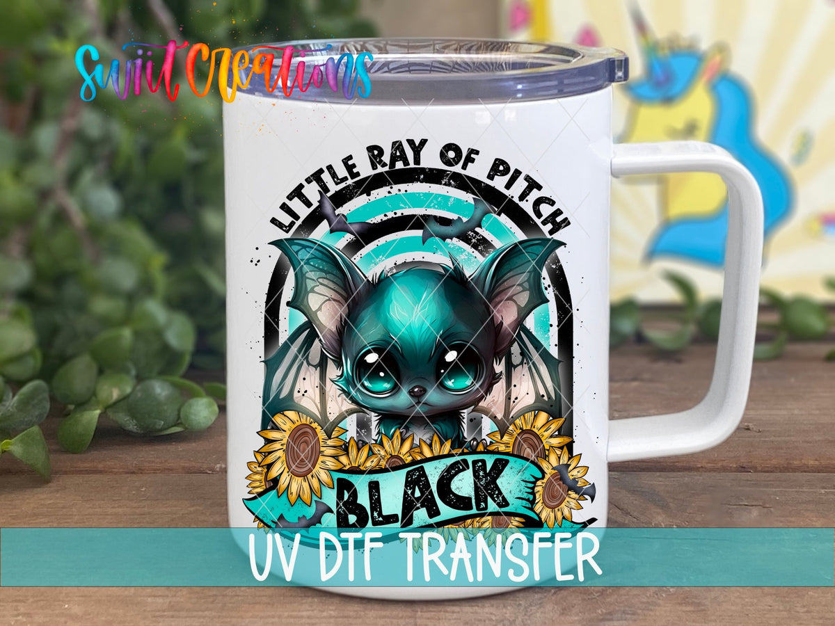 Little Ray of Pitch Black Cute Gothic Bat UV DTF transfer displayed on a white coffee mug from Swiit Creations