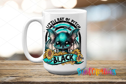 Little Ray of Pitch Black Cute Gothic Bat UV DTF transfer displayed on a white ceramic mug from Swiit Creations