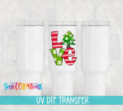 Three white tumblers featuring the Love Christmas Tree UV DTF transfer by Swiit Creations