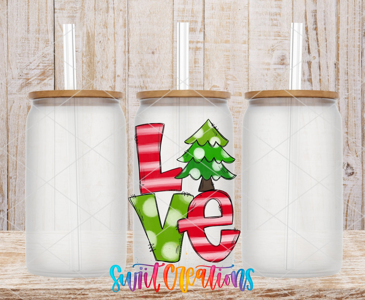Three clear glass cans with the Love Christmas Tree UV DTF transfer by Swiit Creations
