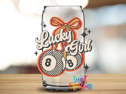 Lucky Girl UV DTF transfer applied to a clear glass can from Swiit Creations
