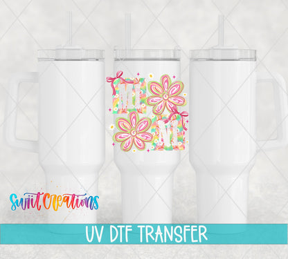 Mini Tie Dye Flowers UV DTF transfer applied to a white tumbler set from Swiit Creations