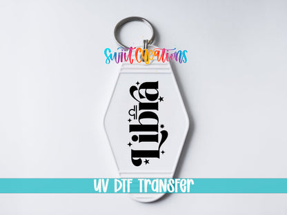 Libra motel keychain UV DTF transfer close-up mockup by Swiit Creations