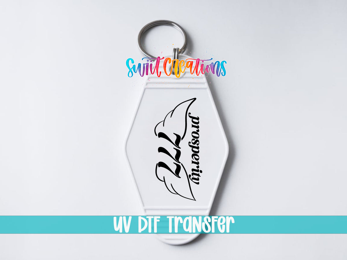 777 Prosperity motel keychain UV DTF transfer close-up mockup by Swiit Creations