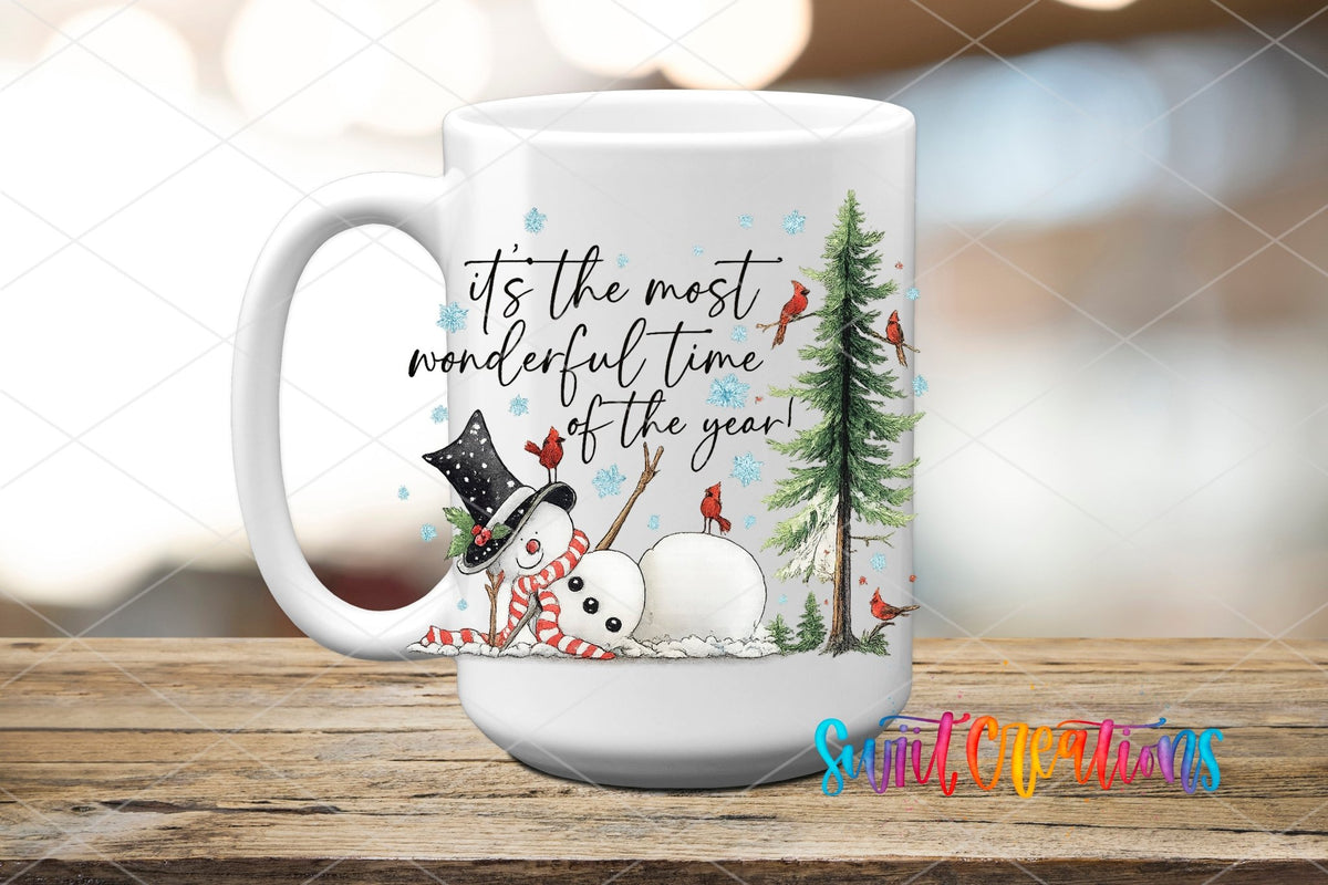 Most Wonderful Time Of The Year Snowman UV DTF transfer displayed on a white ceramic mug from Swiit Creations