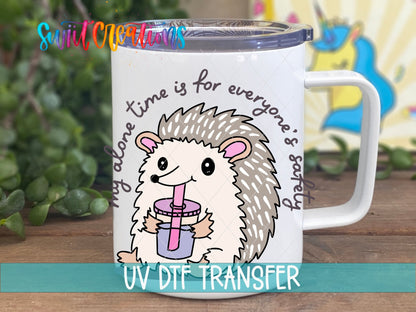 My Alone Time Is For Everyone’s Safety UV DTF transfer displayed on a white coffee mug from Swiit Creations