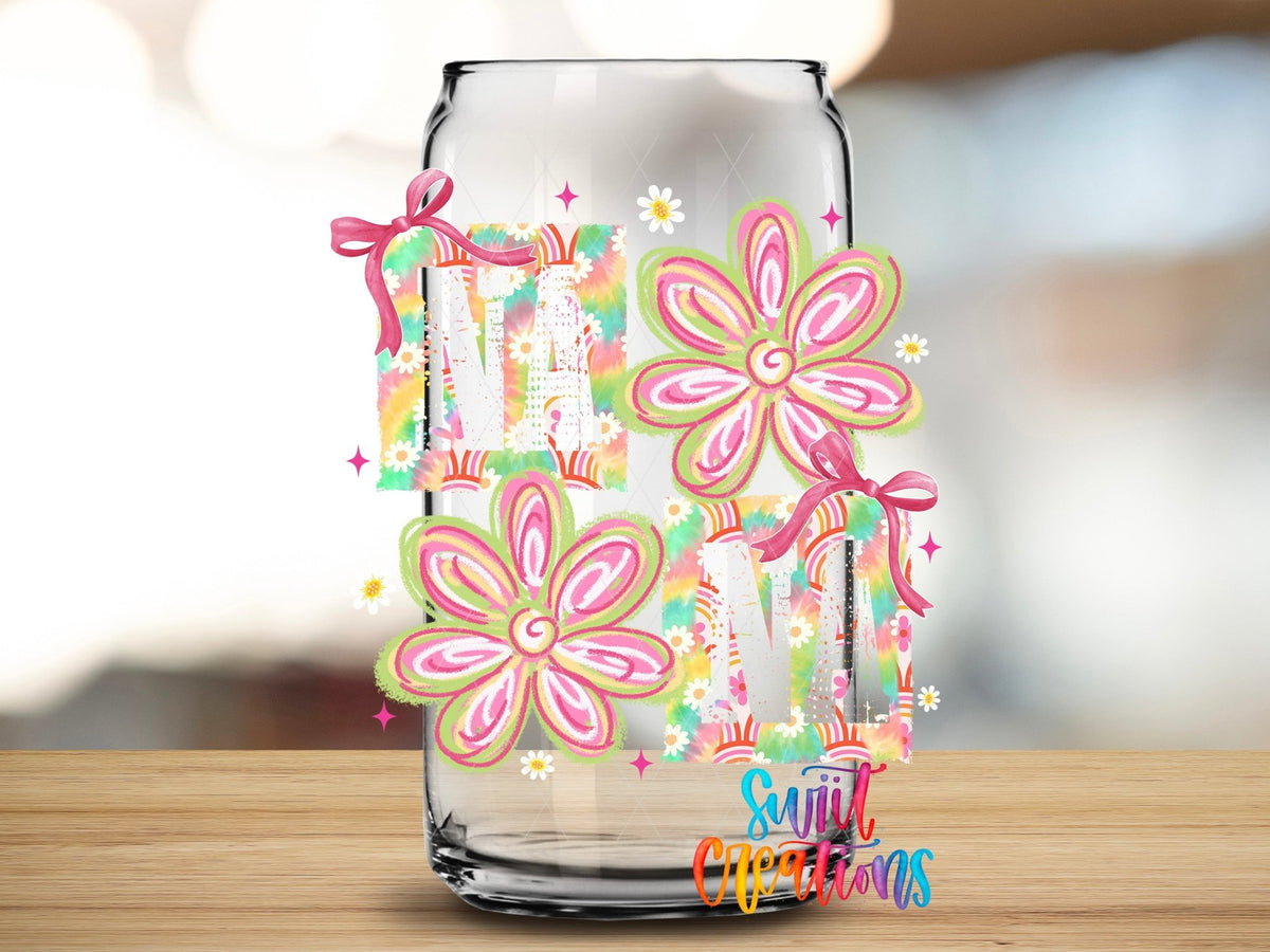 Nana Boho Rainbow Floral UV DTF transfer applied to a clear glass can from Swiit Creations