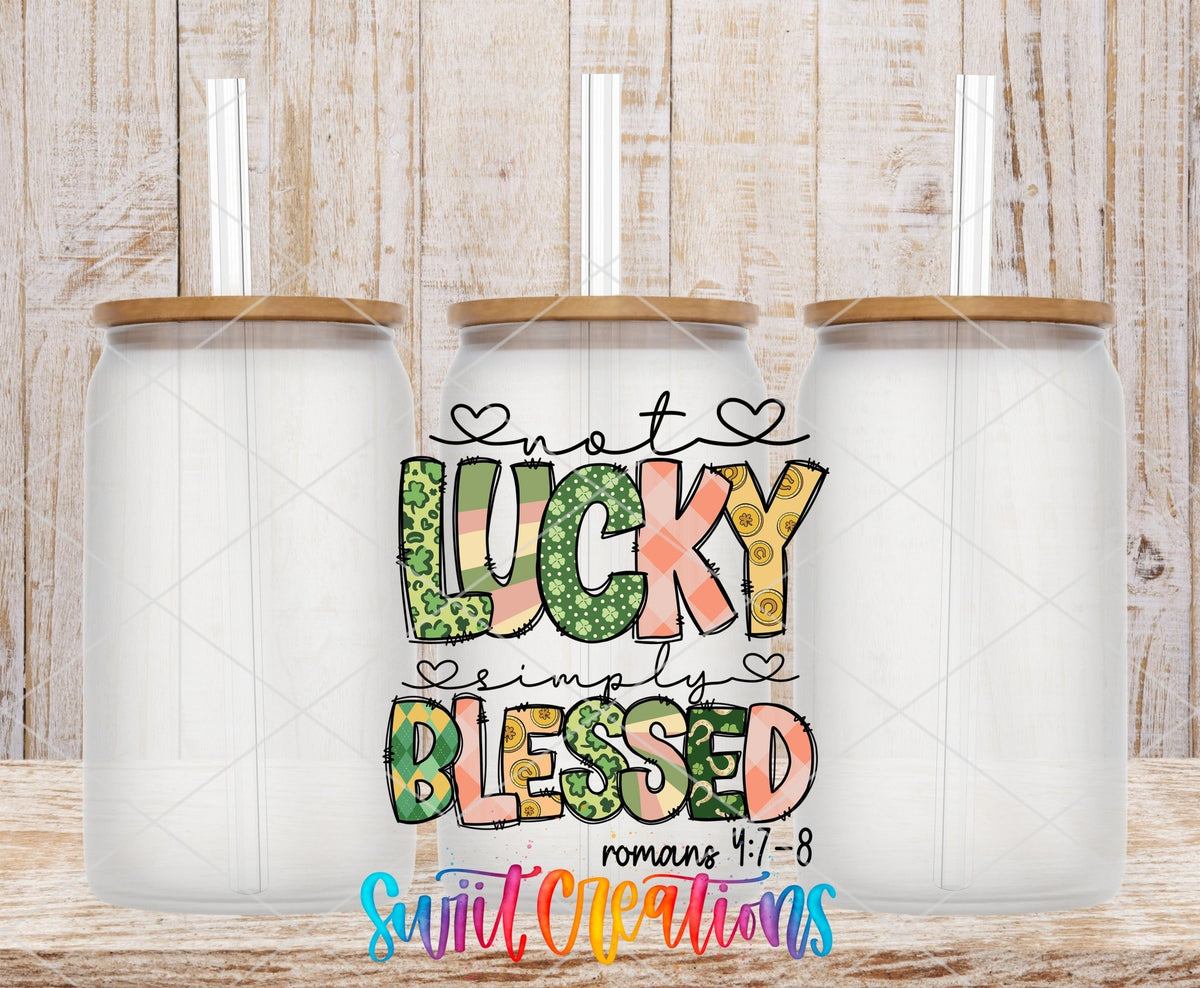 Not Lucky Simply Blessed UV DTF transfer applied to a clear glass can set from Swiit Creations