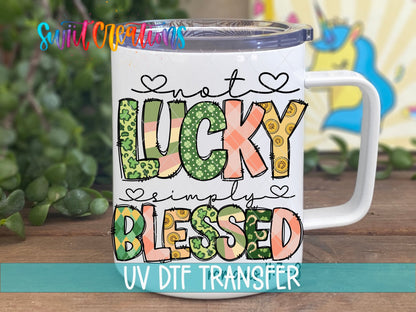 Not Lucky Simply Blessed UV DTF transfer displayed on a white coffee mug from Swiit Creations
