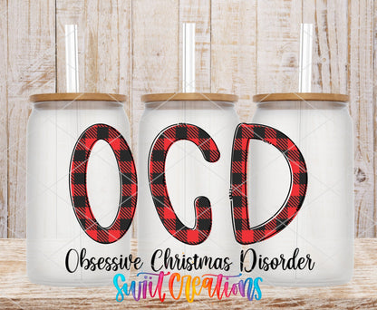 OCD Obsessive Christmas Disorder UV DTF transfer applied to a clear glass can set from Swiit Creations